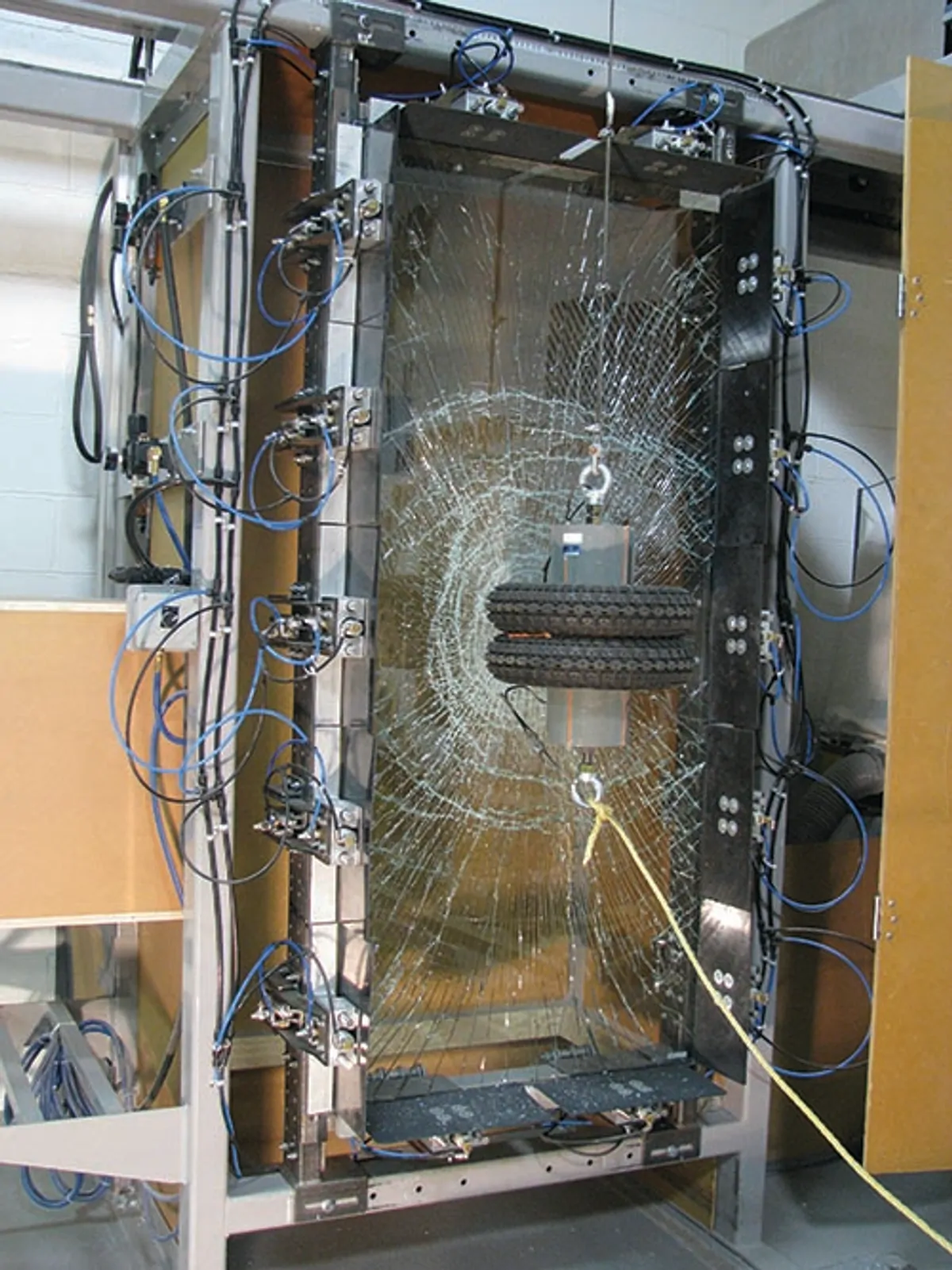 Instrumented glass specimen after an impact test