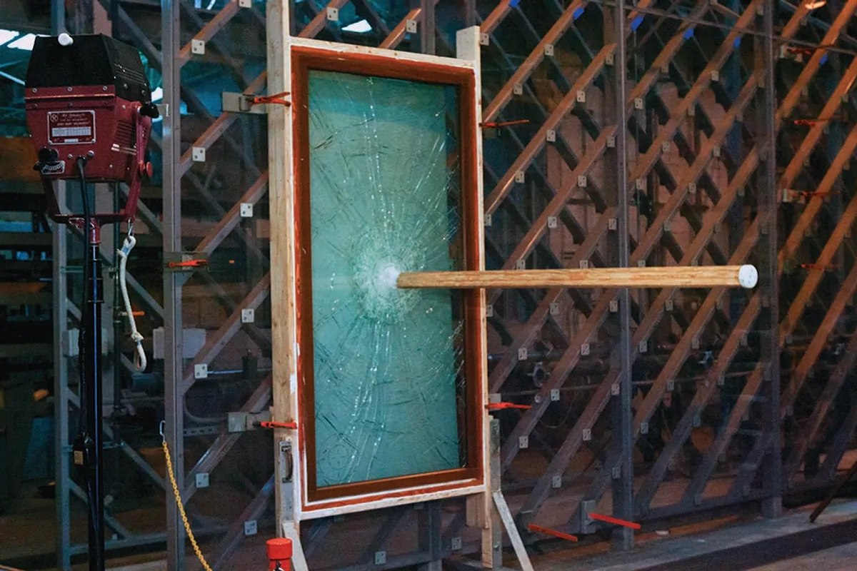 Window specimen undergoing laboratory impact testing